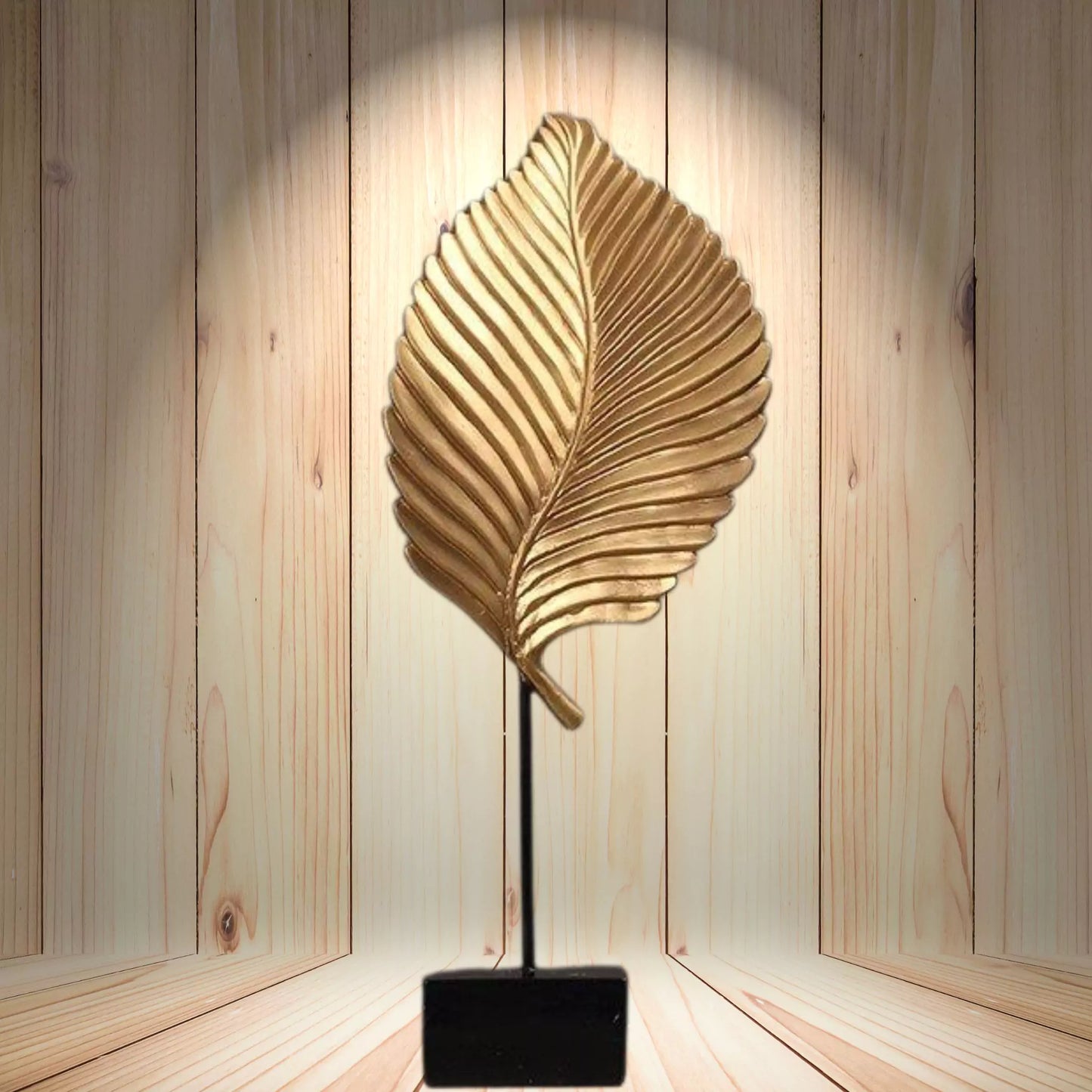 Decorative leaf-shaped lamp on a wooden background
