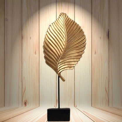 Decorative leaf-shaped lamp on a wooden background